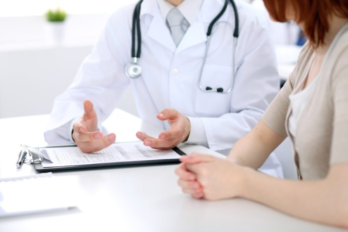 Premium Vector | Doctor having consultation with woman patient in ... Can you drink alcohol while taking mucinex