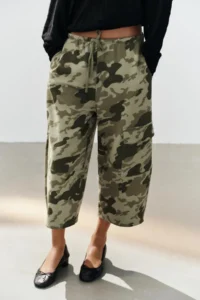 Alexa Chung Unveils the Ultimate Paris Fashion Week Uniform by Pairing Camouflage Pants with Classic Ballet Flats