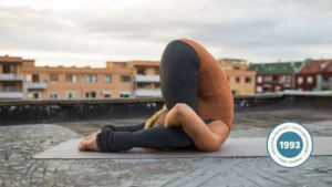 Deepening the Practice of Karnapidasana: A Historical and Anatomical Retrospective from the Yoga Journal Archives